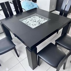 solid dark wood counter height dining table