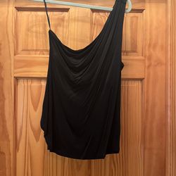 One shoulder strap top. Very pretty. Color black. Stretchy material. Size XL