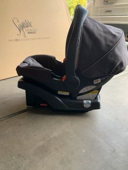 Infant car seat with base