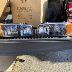 99-06 GMC Sierra Yukon Black Housing Headlights Pair