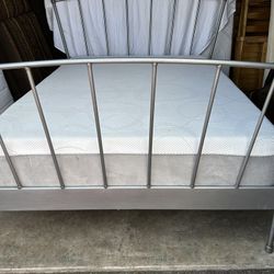 Beautiful Queen size bed includes IKEA metal frame and a gel foam mattress 