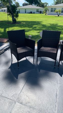 4 wicker chairs and folding table
