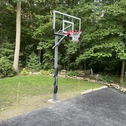 Goaliath 60 inch in ground basketball hoop, adjustable basketball court 
