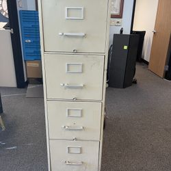 4 Drawer Metal File Cabinet – Commercial Grade – Used  Description: • 4 drawer vertical file cabinet • Heavy-duty metal construction • Commercial grad