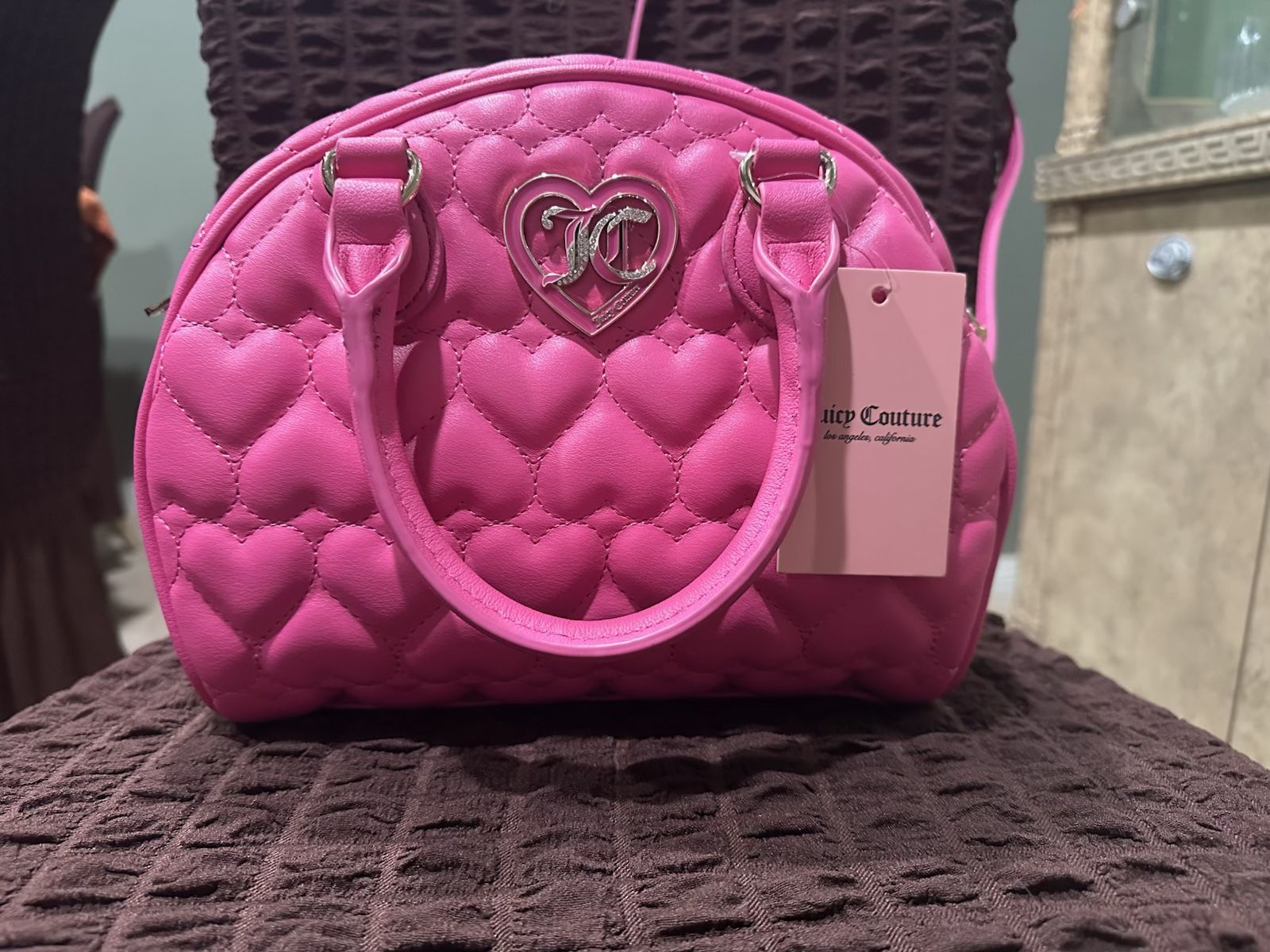 Juicy Couture Flawless Dome Satchel in a vibrant pink faux leather