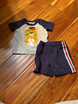 Baby boy’s carters cheetah baseball shirt set. Size 3 months