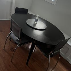 Oval dark stain dinning table
