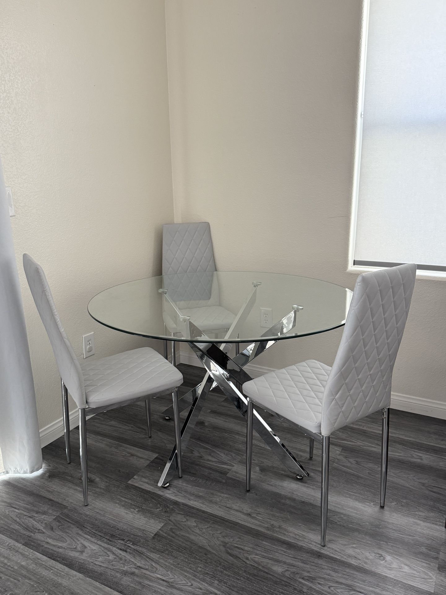 Glass Table And Leather Chairs
