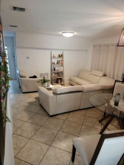 Large beige leather sectional