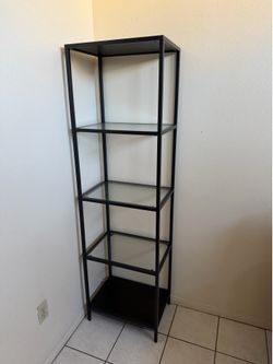 Black glass bookcase