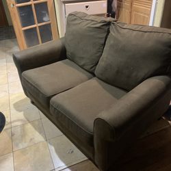 Ashley. Olive Green Chair Sleeper $500 OBO