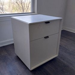 A White Colored Side Table With Storage on sale