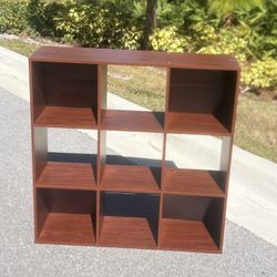 Cubeicals 35.86 in. H x 35.86 in. W x 11.63 in. D Dark Cherry Laminate 9-Cube Storage Organizer. Good condition. Location below  31705 Wesley Chapel b