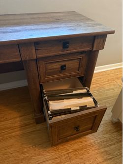 Desk with a filing draw