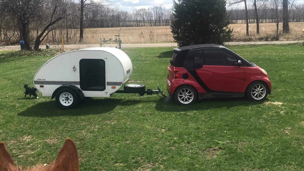 Smart Car And Little Guy Camper