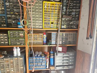 Metal and plastic containers *(63) sixty three cabinets containing merchandise!