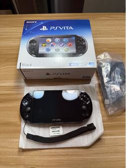 PS Vita 2000 with 128GB Memory Card adapter with games