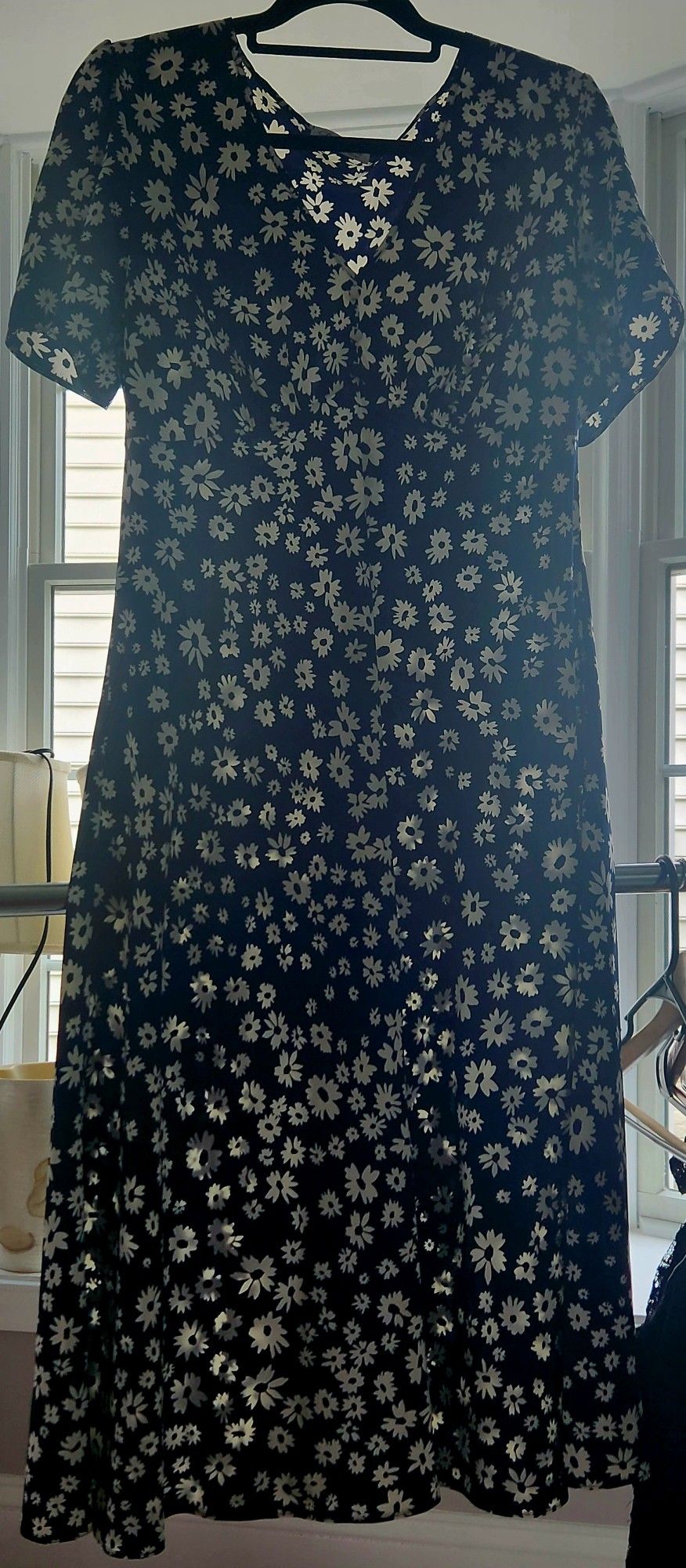 A Long Navy Blue And White Flower Dress.