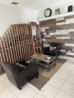 Two Leather Chairs And Wood Industrial Table