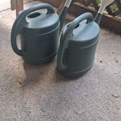 2 Plastic Watering Cans