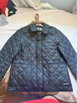 Woman’s Burberry jacket
