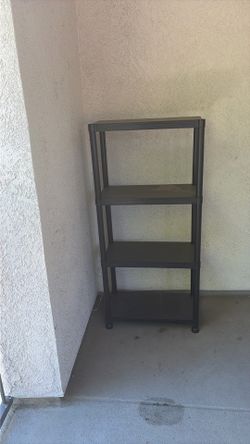 Heavy duty, plastic black shelf