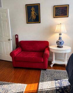 Solid wood oval accent table with one center drawer and a beautiful lightly distressed white finish. This is a very heavy, well built piece that would