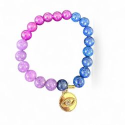 Glass beads with gold evil eye charm