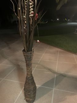 Tall wicker vase w flowers