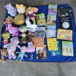 Lot of stuffed animals and kids books