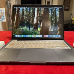 MacBook Pro 2020, M1 Chip, 16GB RAM, 512GB SSD, Touchbar, Case Cover+Keyboard Cover+Screen Protector+Charger, Extras Available….