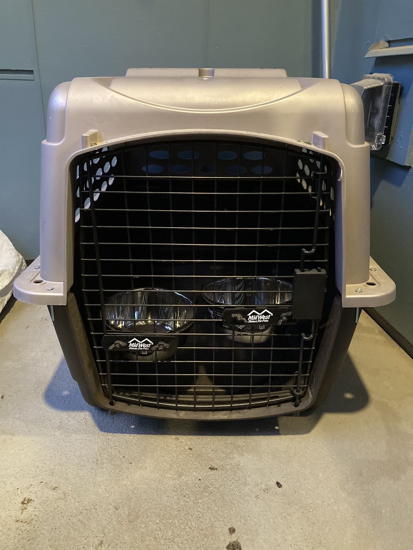 Pet Carrier With Attached Food/Water Bowls