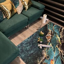 Green Section and area rug Pillow Covers and Gold coffee Table 