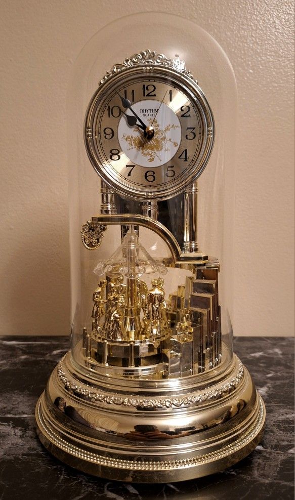 ANTIQUE RHYTHM QUARTZ CLOCK WITH SPINNING DANCE BALL - MADE IN JAPAN