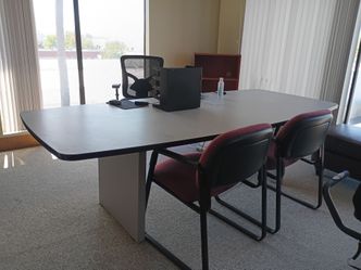 Large conference table with 6 matching chairs