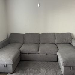 Grey Couch With A Pull Out