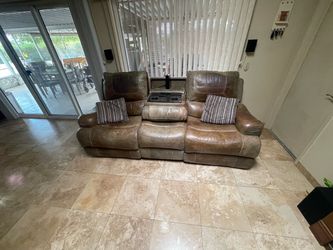 Faux leather power love seat