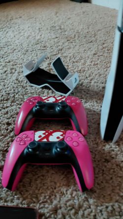 Two PS5 DualSense Controllers Pink with Charging Station
