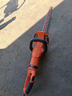 24 in. 3.3 Amp Corded Dual Action Electric Hedge Hog Trimmer with Rotating Handle