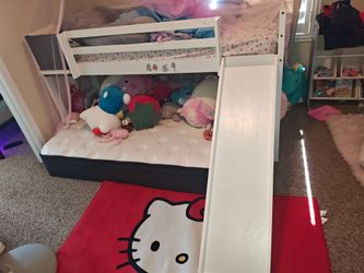 Twin bed with slide