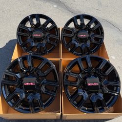 20” GMC Sierra original factory rims in new gloss black EXCHANGE 600.00 BUY 1200