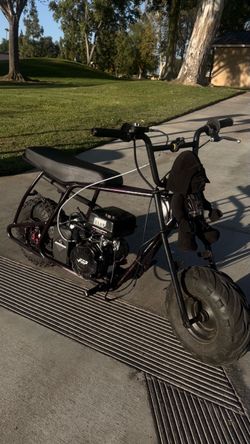 It has a trumpet exhaust. It’s really loud, but it has no chain because the chain fell off.