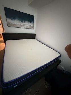 Nectar Cali King premier hybrid mattress with upholstered headboard