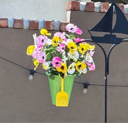 Beautiful faux flower arrangement for outside
