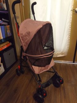 Used Small pink stroller For Dog/ Zipper Cover
