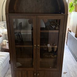 Beautiful Brown Arched Cabinet Bookshelf/Pantry with Glass Doors!! 31in W x 16.5in D x 71.25in H
