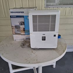 Arctic King 35-pint or 50-pint Energy Star dehumidifier. 