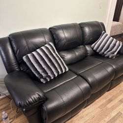 Used Reclining leather sofa and love seat