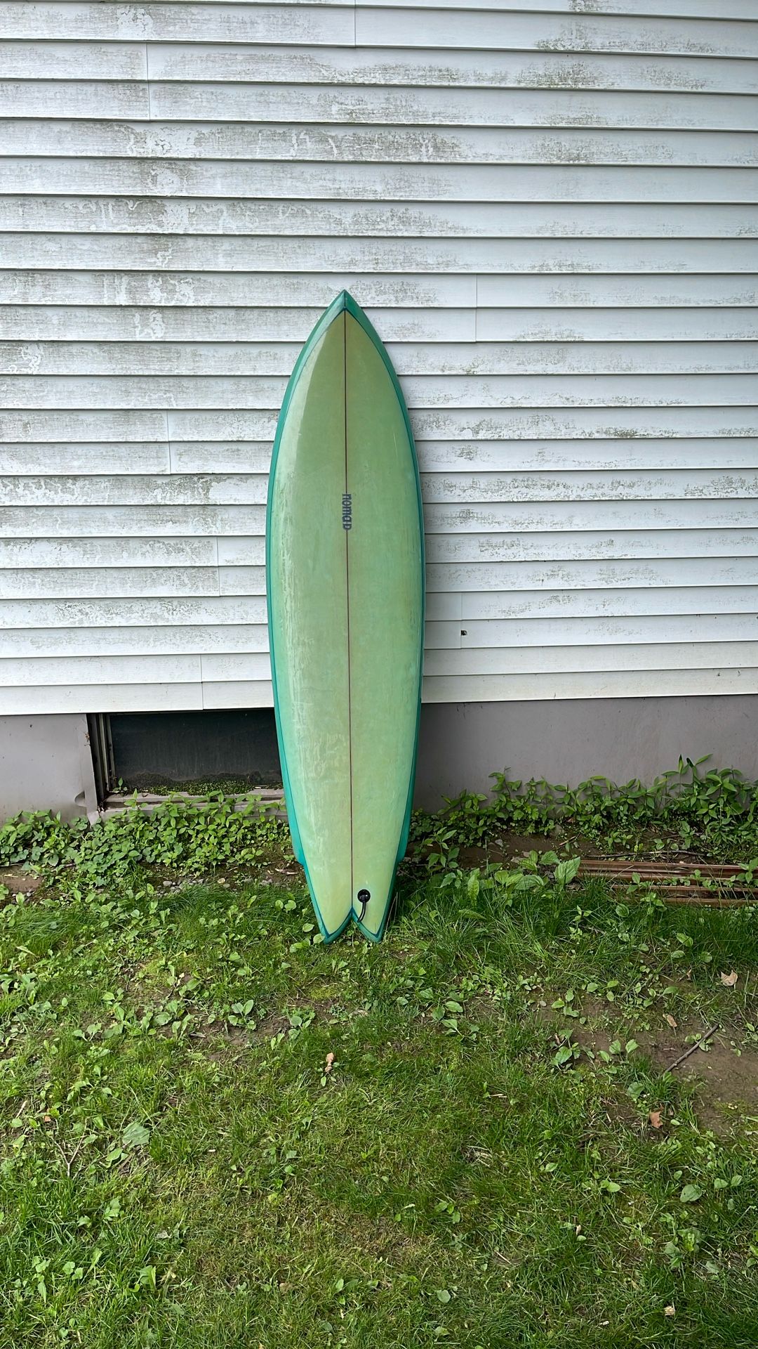 Vintage single fin Nomad surfboard