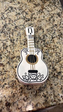 Coco guitar piggy bank